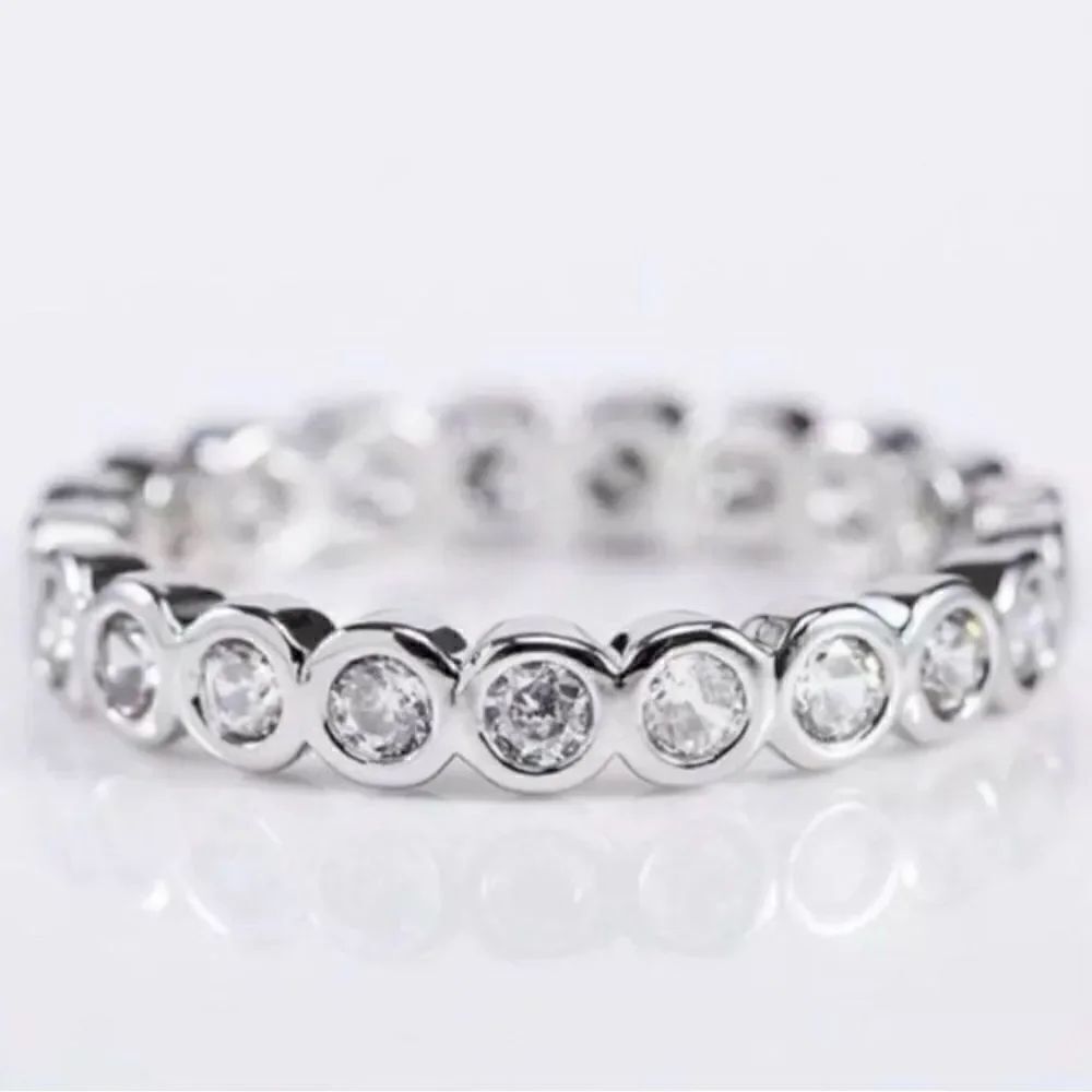 The Brilliant Bezel eternity band withโzircon in Sterling Silver szโ5